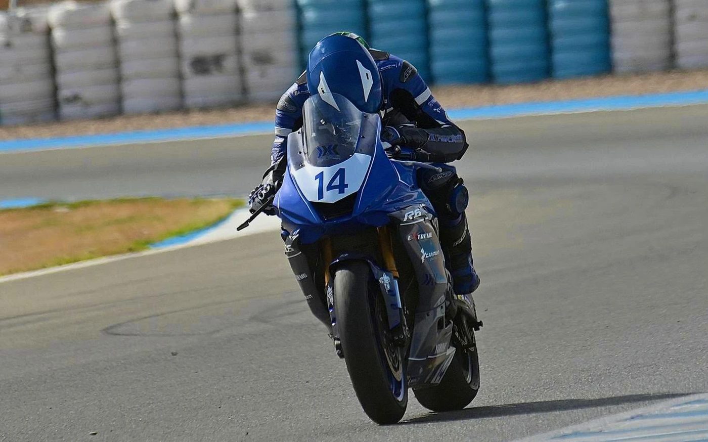 Javier Pérez Molina on his number 14 bike, entering a corner